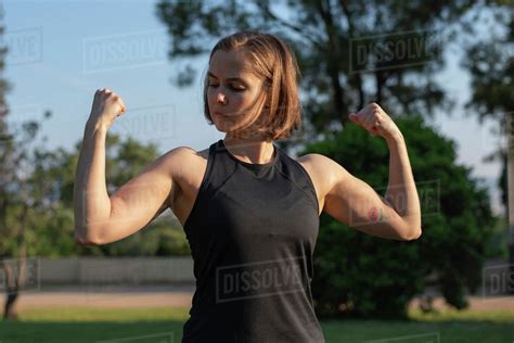 muscle woman flexing